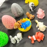 Fun mystery egg toys with hidden articulated figures by Vinglits